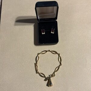 Purple and Gold Clip on Earrings. Gold  tone bracelet.  Very pretty and stamped.